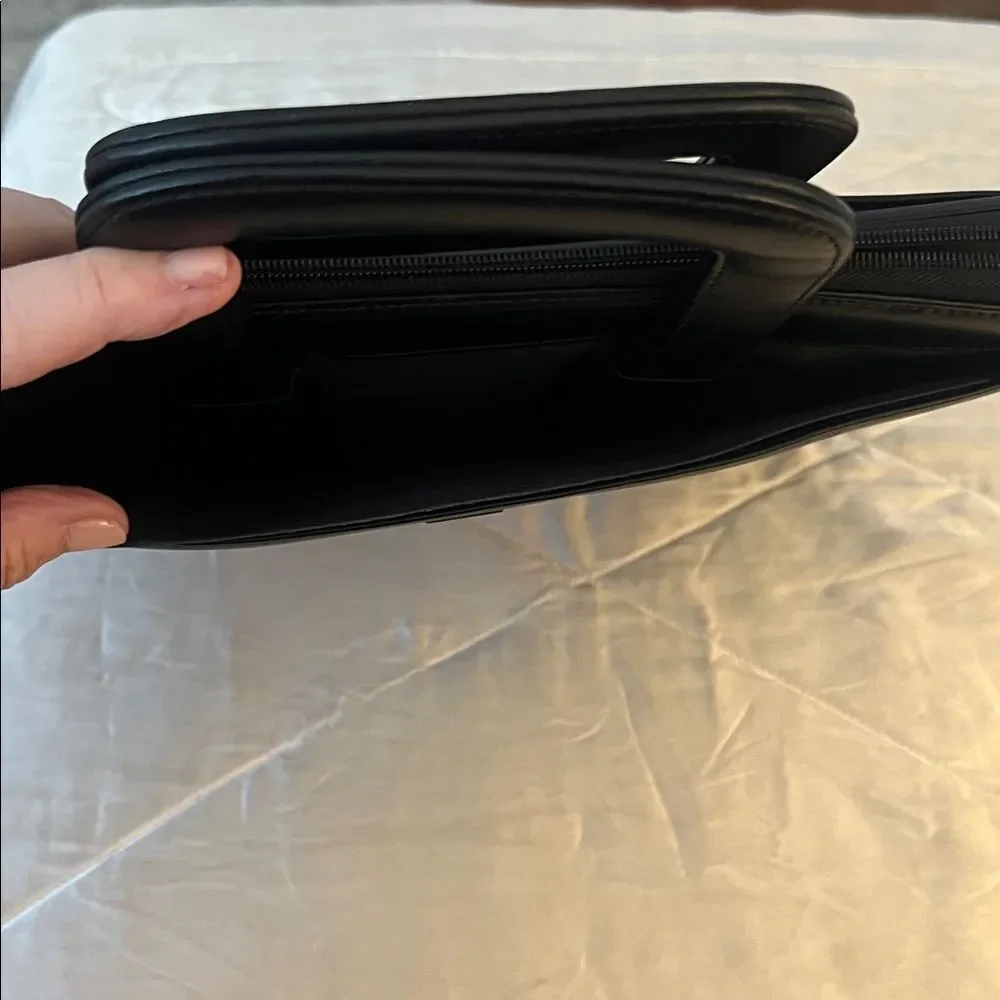 Tumi executive black leather portfolio case with pull out handles